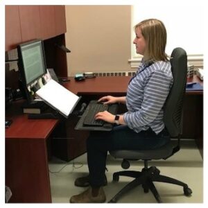 woman sitting in office chair