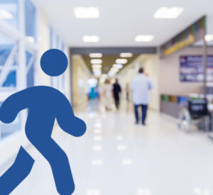 hospital corridor with doctor walking away